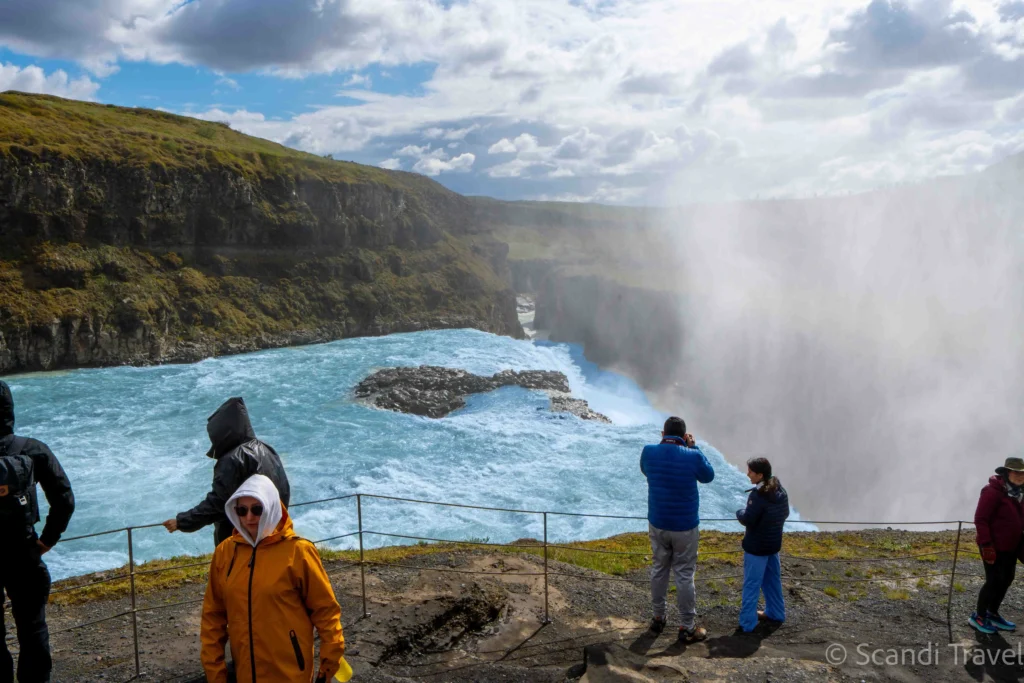 ourists viewing Gullfoss waterfall in Iceland’s Golden Circle