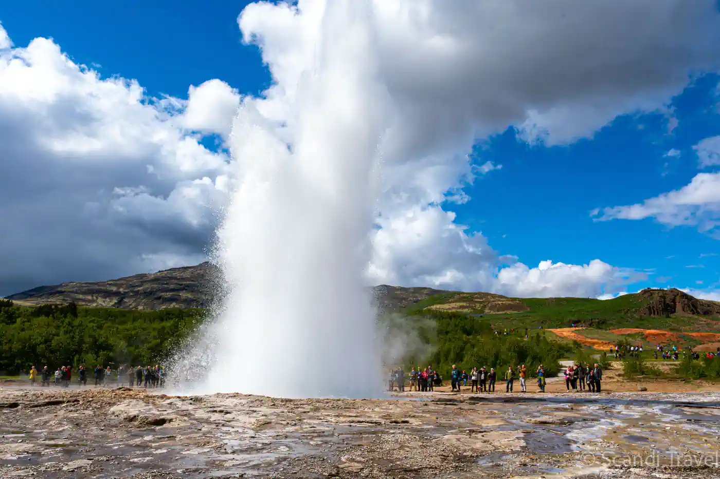 Strokkur geyser erupting in Iceland’s Golden Circle during Scandi Travel guided tour
