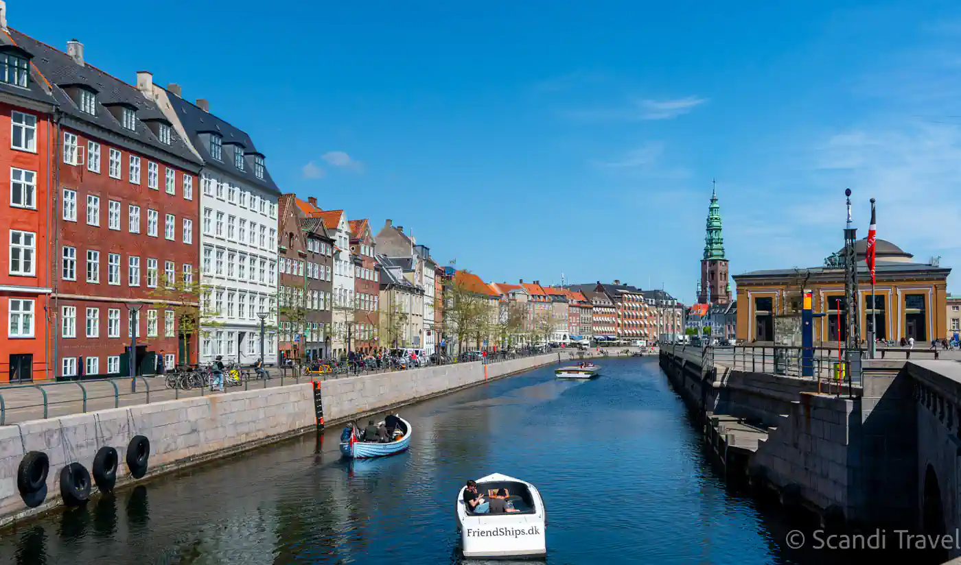 Copenhagen canal with colorful historic houses and boats – Scandinavia tours highlight