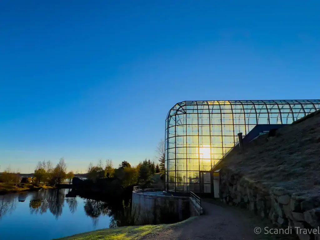 The iconic glass atrium of Arktikum Museum in Rovaniemi during an 8-day Finland tour in spring and summer.