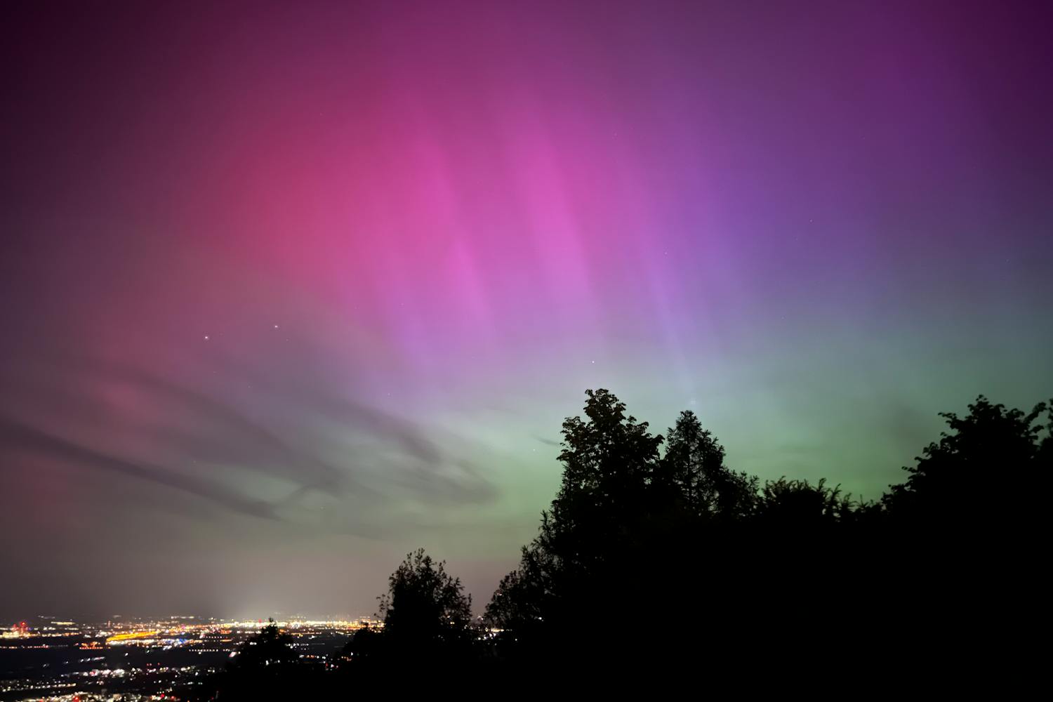 Pink Aurora Borealis at Night