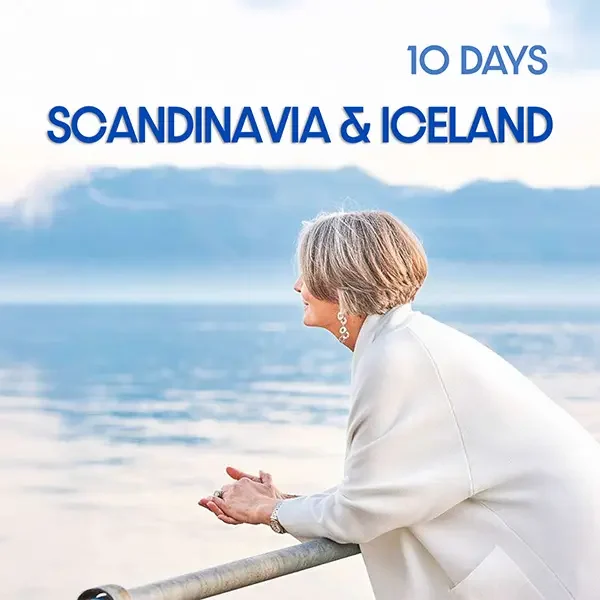 Senior woman enjoying scenic fjord view on 10-day Scandinavia and Iceland tour